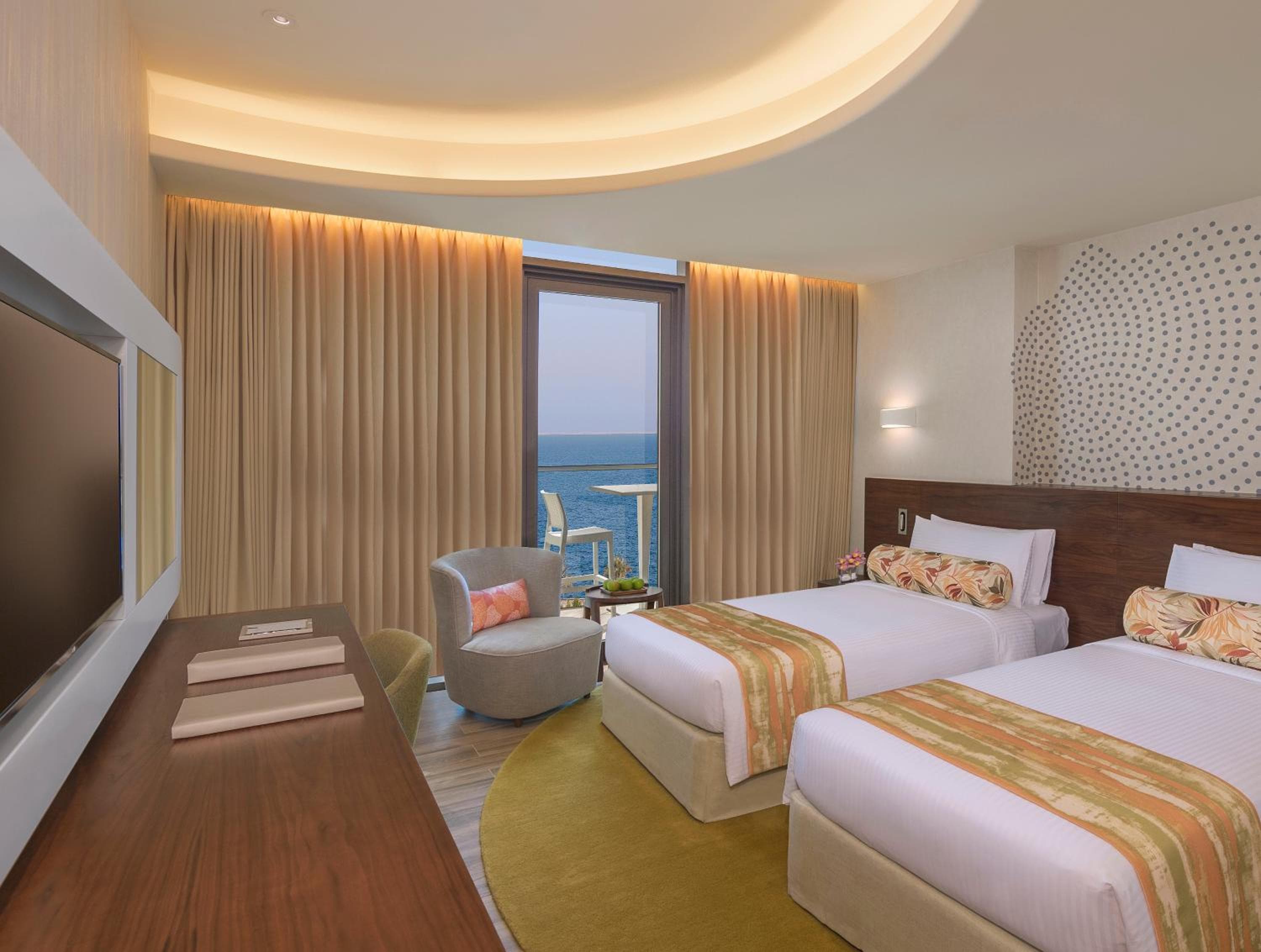 Deluxe Zimmer mit Balkon and seitlicher Meerblick