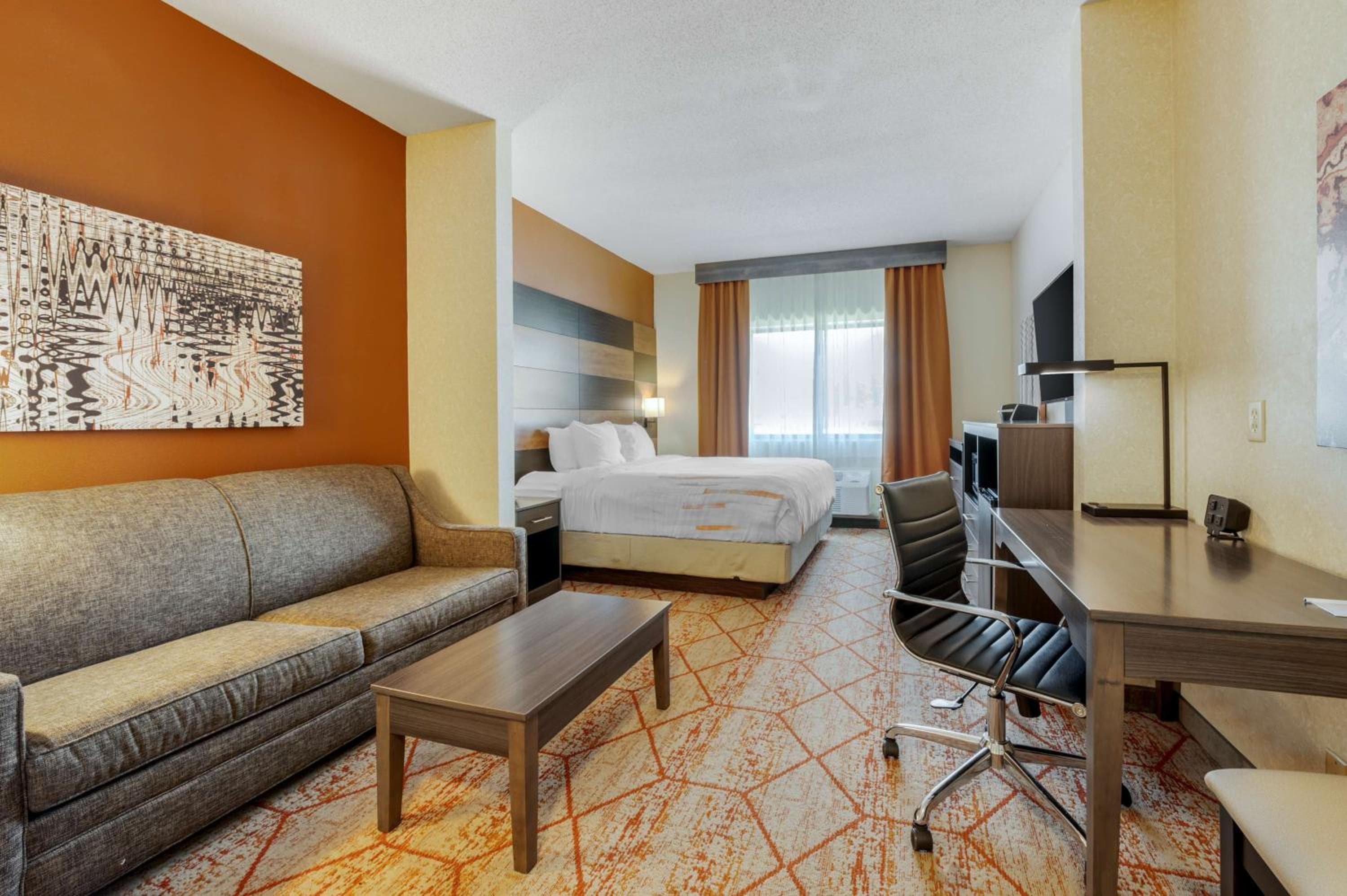 Habitación King con Sofá Cama