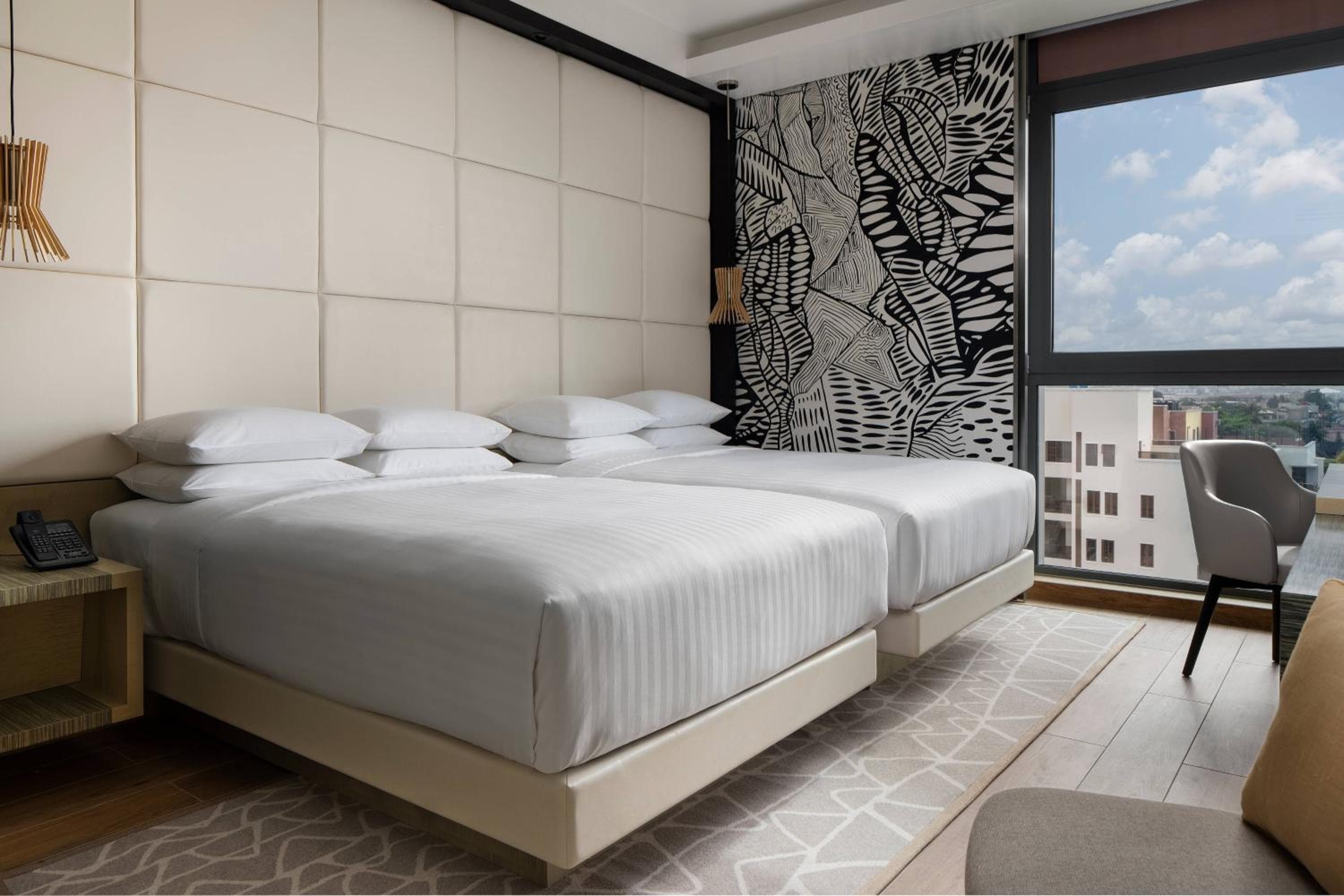 Doppelzimmer mit zwei Doppelbetten