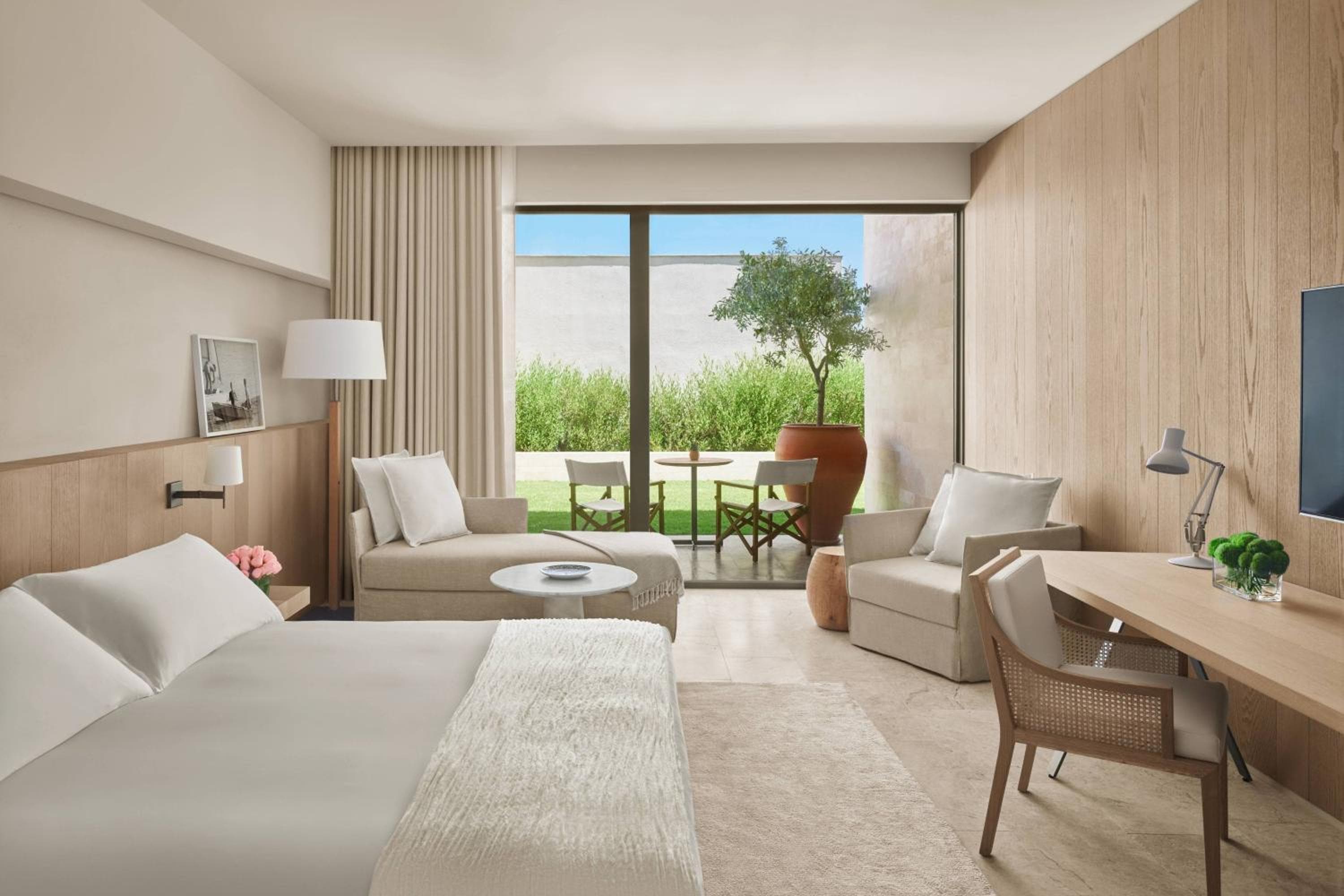 Deluxe King Zimmer mit Gartenblick und Balkon